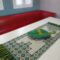 Rectangular tablecloth with embroidery in green